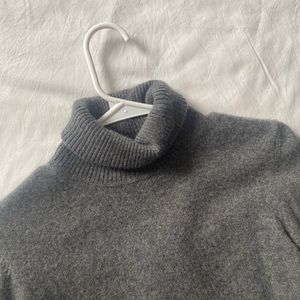Grey turtleneck sweater